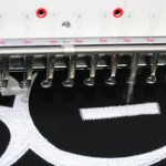 Jonas Druck Produktionsprozess der Textilveredelung mit Stickerei.